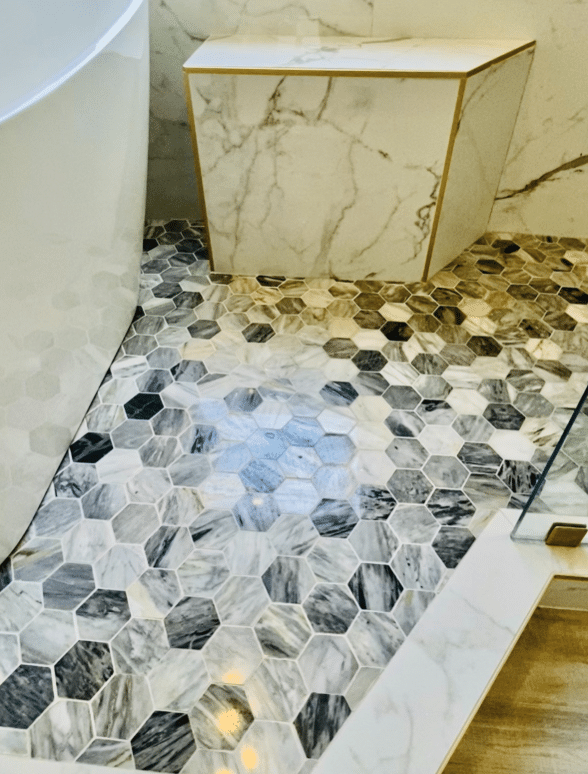 costome-bench-golden-edges-luxury-marble-bathroom-the-woodlands